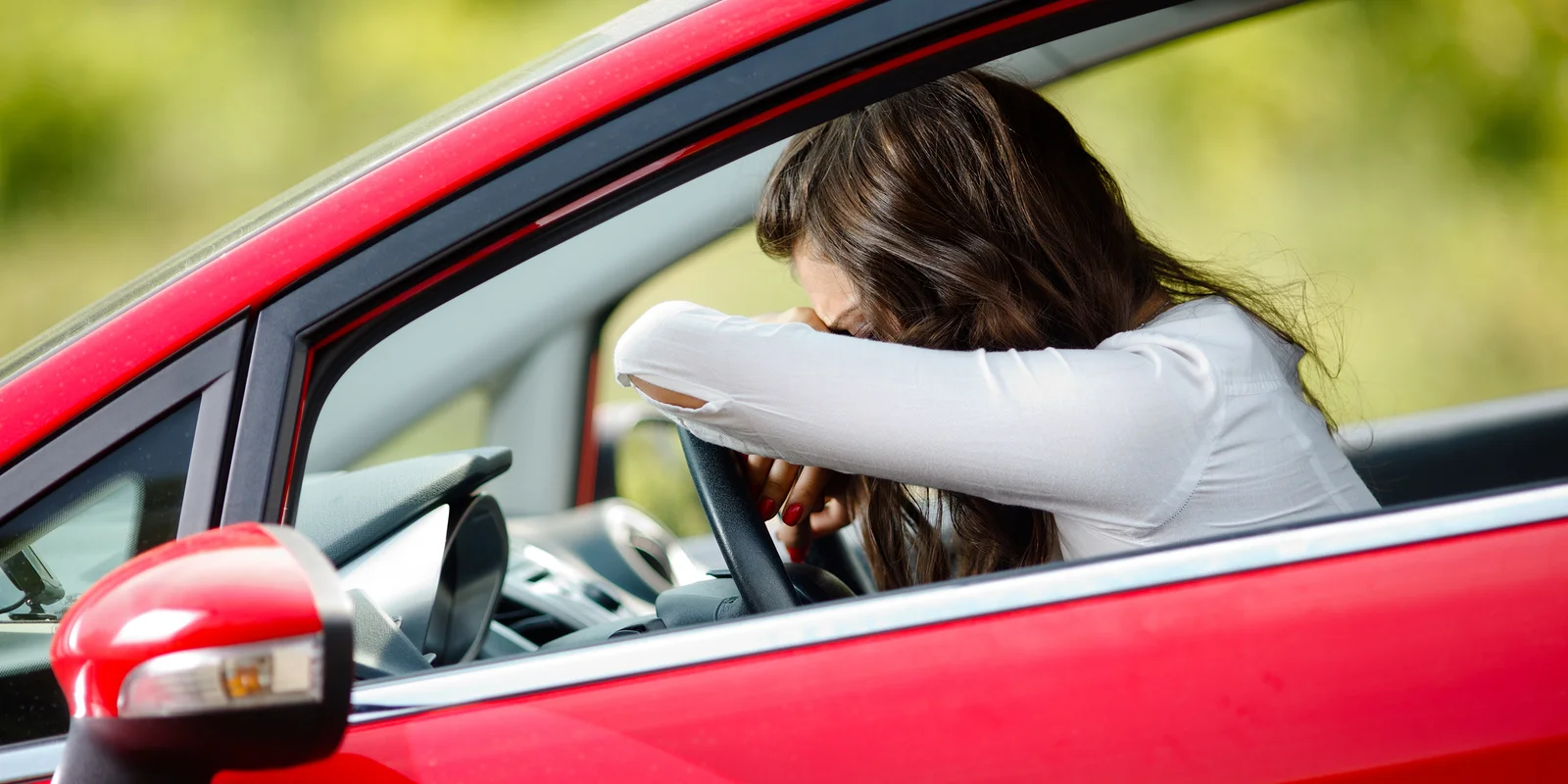 Disappointed lady in the car